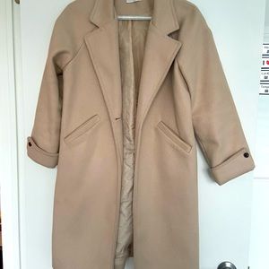 Beige/brown pea coat.